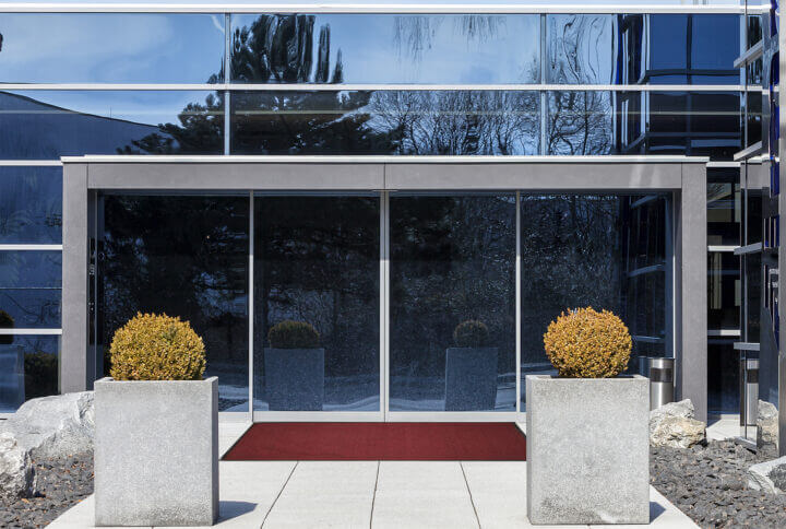 a commercial entranceway featuring a mat