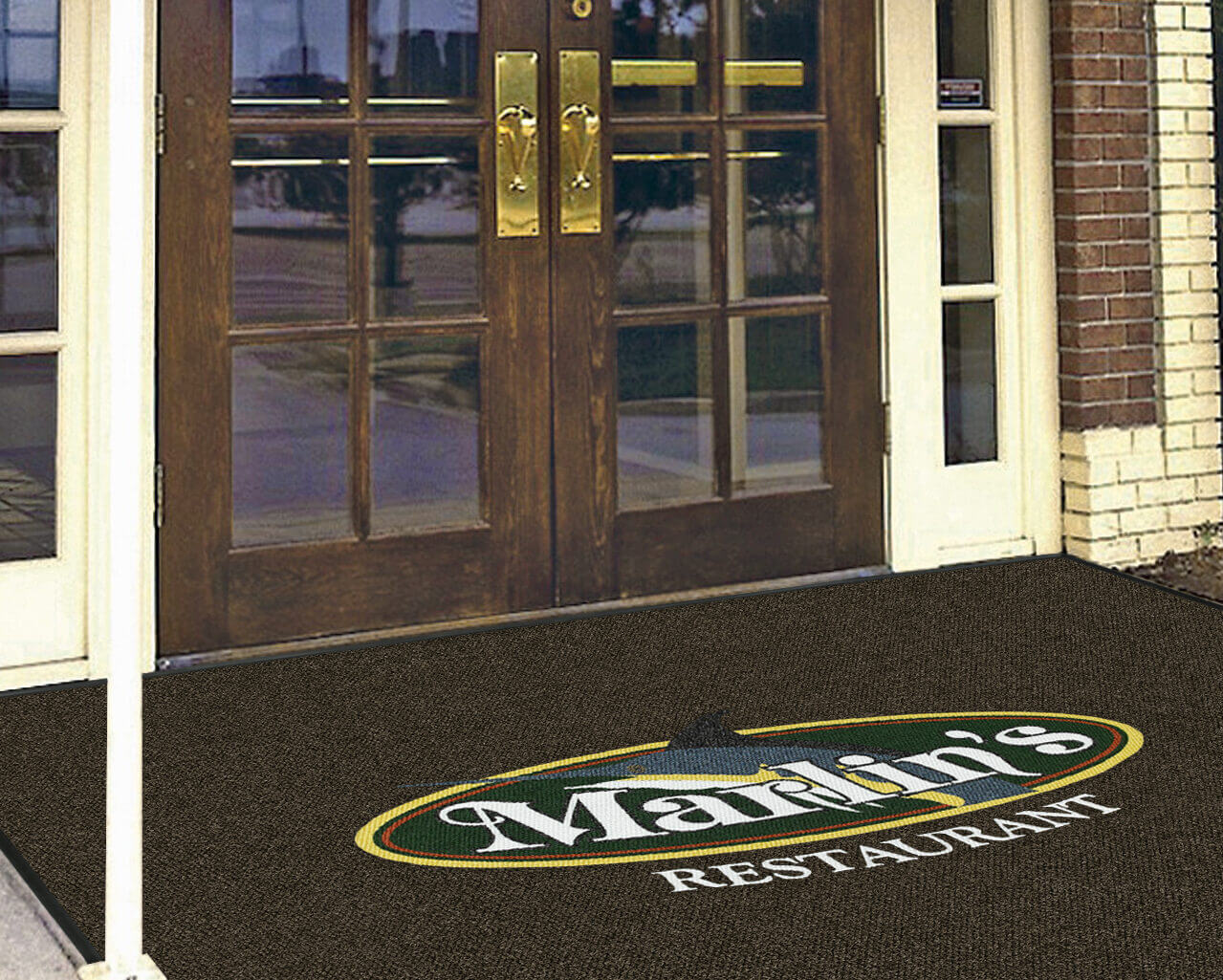 custom logo mat in the entrance of a restaurant
