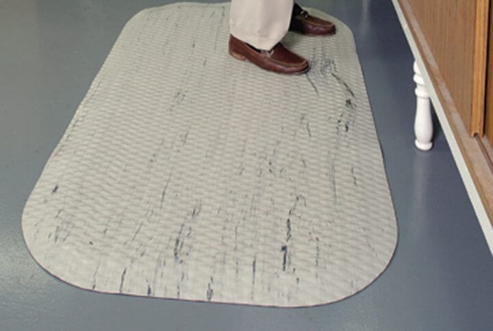 man standing on a hog heaven marble mat
