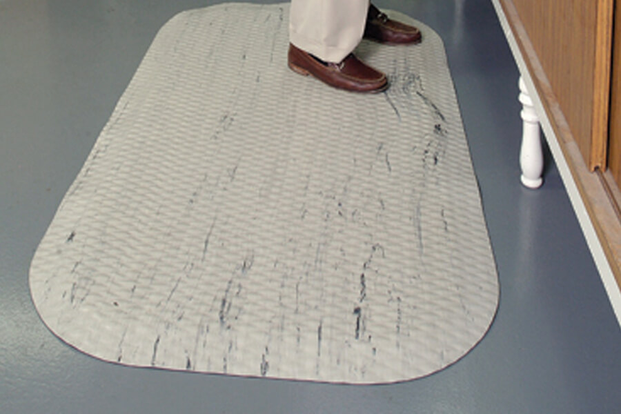 man standing on a hog heaven marble mat
