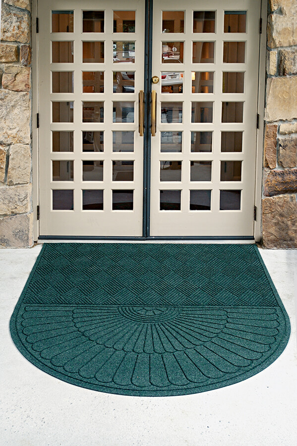 Waterhog Eco Grand Premier mat in front of a business's entryway